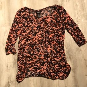 Rose design shirt. Stretchy and cute! Was one of my favorites! Size small.
